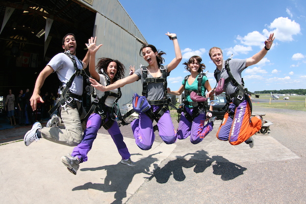 Student Skydivers Jumping in the Air before Skydive