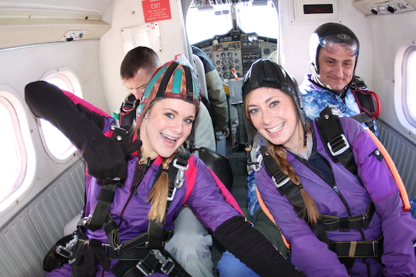 Two Tandem Skydiving Students in Airplane