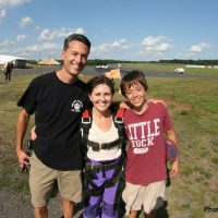 family photo with tandem skydive student