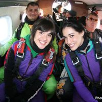 friends in skydiving airplane