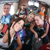 group in plane before skydive