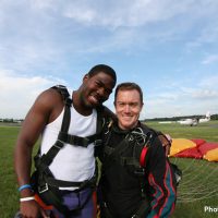 Skydive Orange student and instructor after successful landing