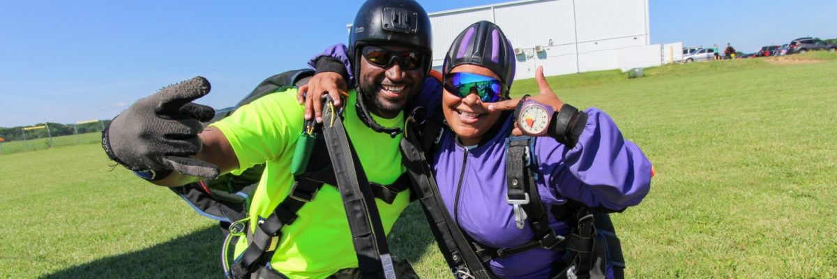 tandem skydiving beginner excited after landing