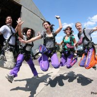 tandem skydivers jumping skydive orange