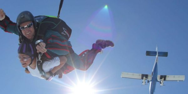 first time skydiver dressed in short sleeves